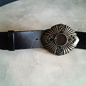 Synthetic leather belt with beautiful intricate metal buckle
